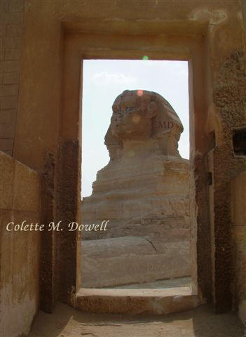 Image of Sphinx looking through Valley Temple door photograph by Colette Dowell